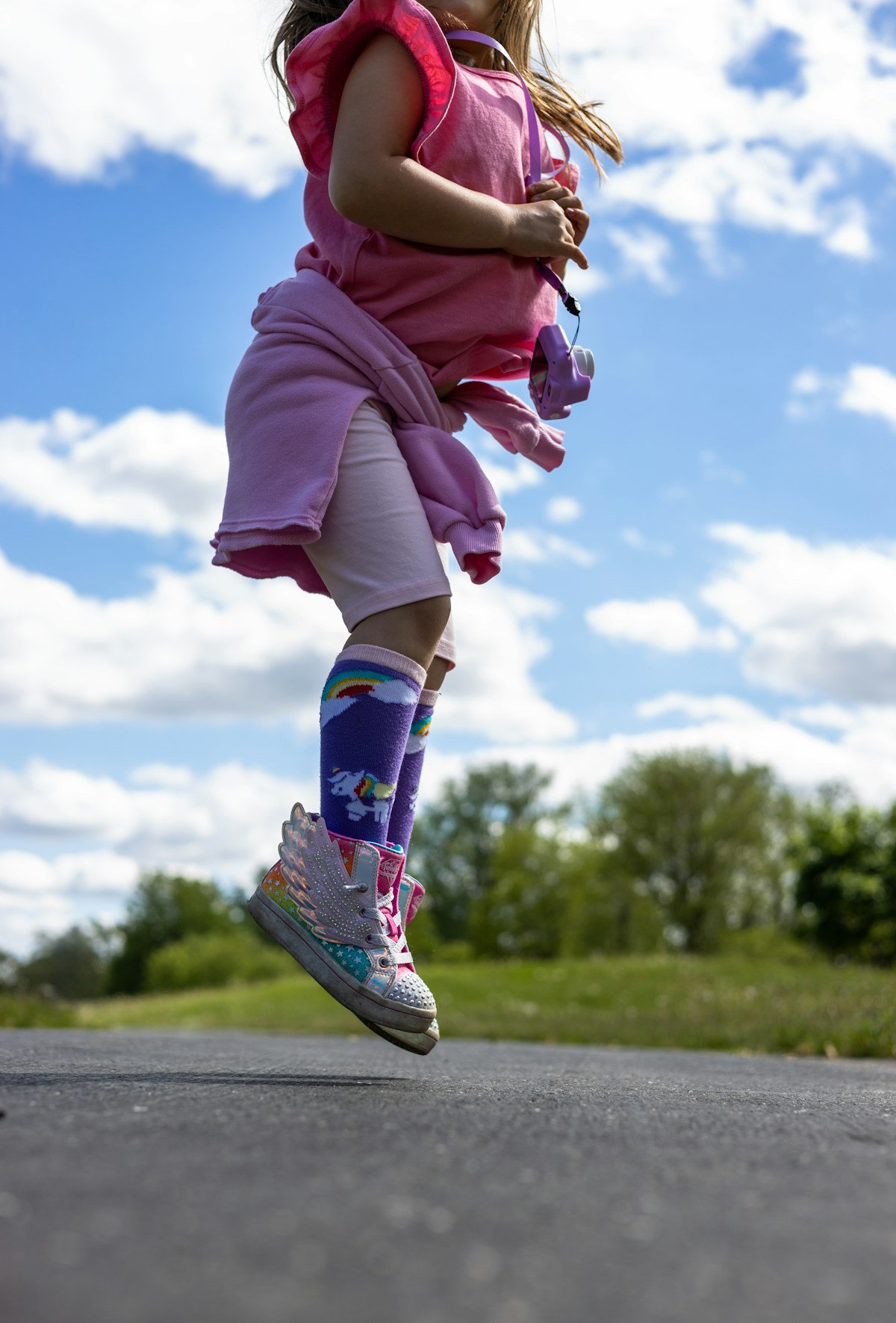 Girl jumping high in the air
